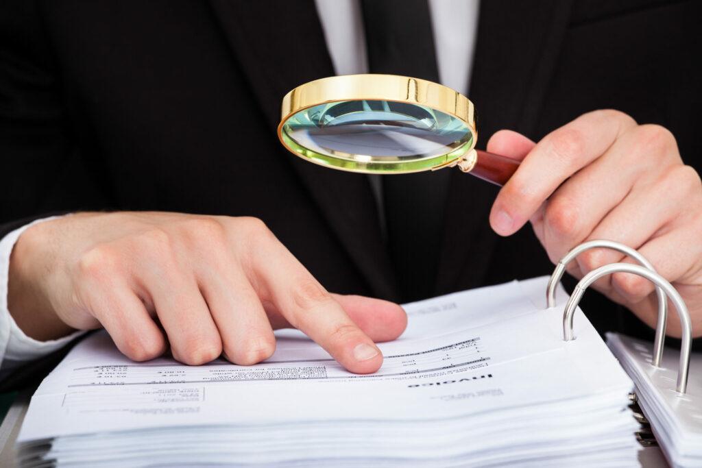 Businessman Analyzing Document Businessman Analyzing Document
