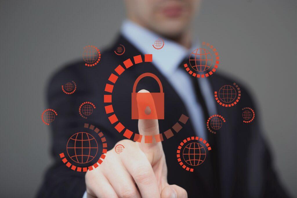 businessman pressing cyber security button on virtual screens cybersecurity-screen-technology-business