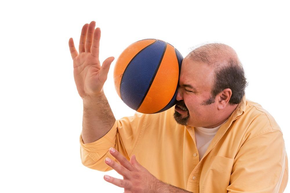 Man with baseketball resize Man with baseketball