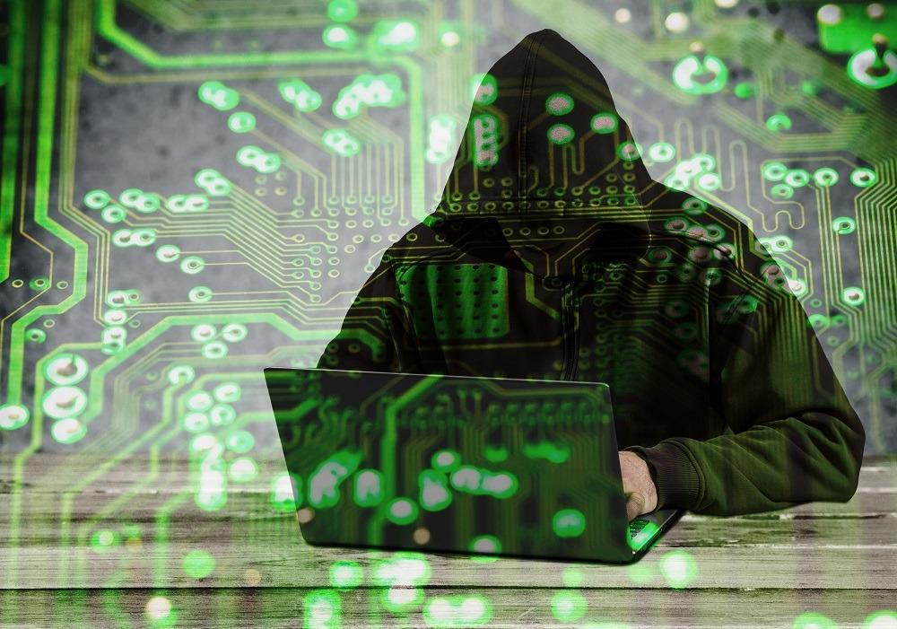 hacker-using-laptop-resized knight vintage