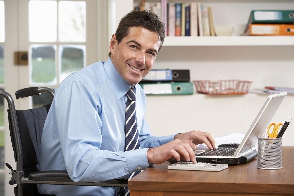 Man Working From Home Using Laptop man working from home