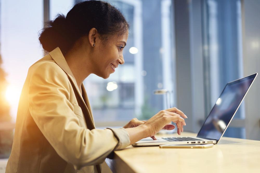 woman-working-on-computer-sm woman working on computer